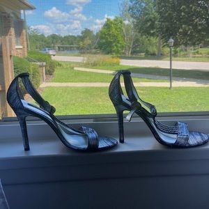 Beautiful silver Nina heels, size9M & only worn once! Rhinestones on the strap!